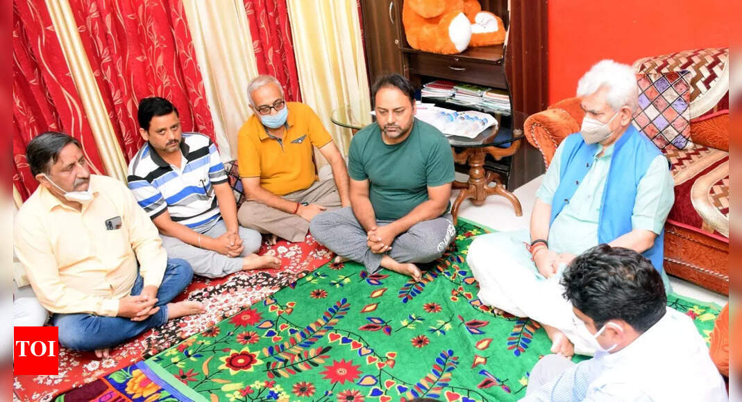 J&K LG Manoj Sinha visits family of slain teacher Deepak Chand, assures all support