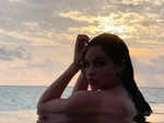 Gabriella Demetriades bids goodbye to her beach holiday in Cyprus in a stylish bikini and sarong