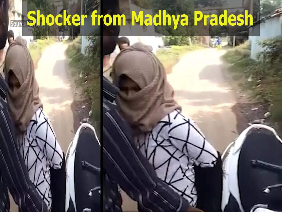 Viral video Woman forced to remove burqa and hijab by mob in Madhya Pradesh News
