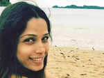 Mommy-to-be Freida Pinto flaunts her baby bump in her latest swimsuit pictures