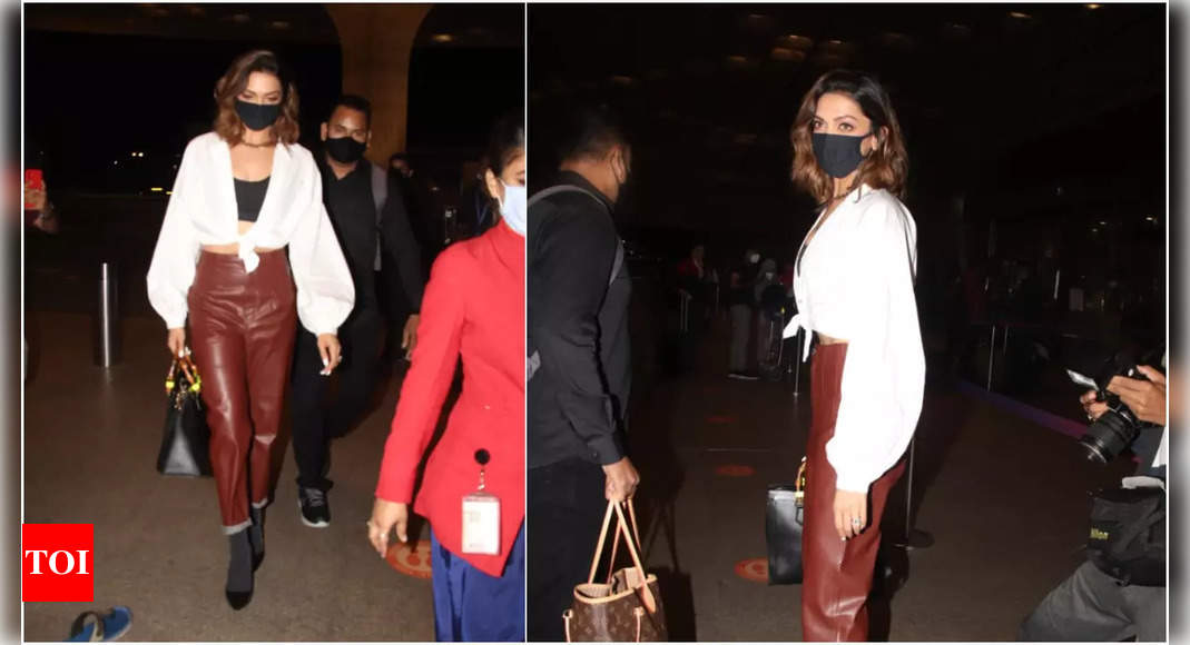 Deepika Padukone makes yet another stunning airport appearance in leather  pants and crop shirt