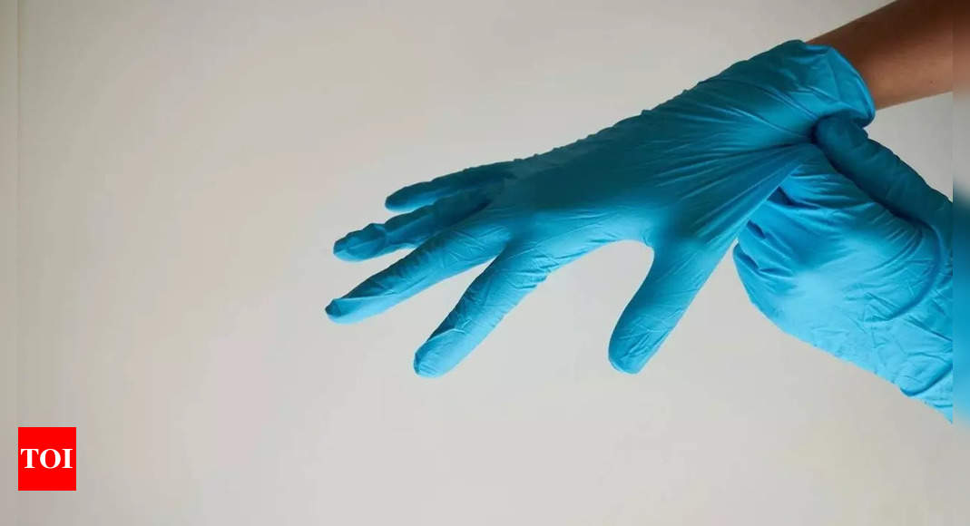 malaysia:  US bars disposable gloves from Malaysia over forced labor – Times of India