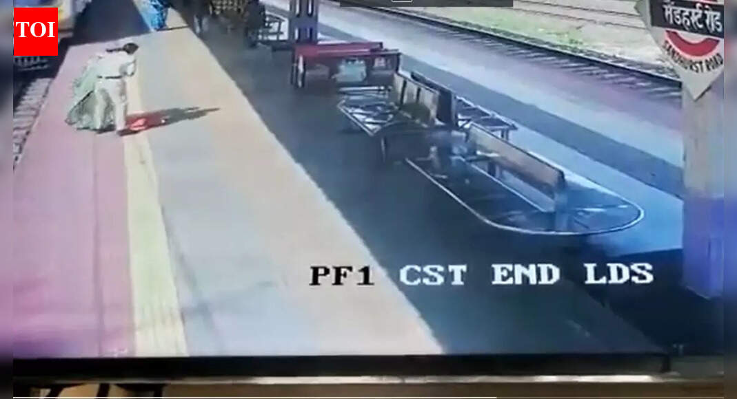 Rpf: Watch: RPF constable saves woman who fell from train at Sandhurst ...