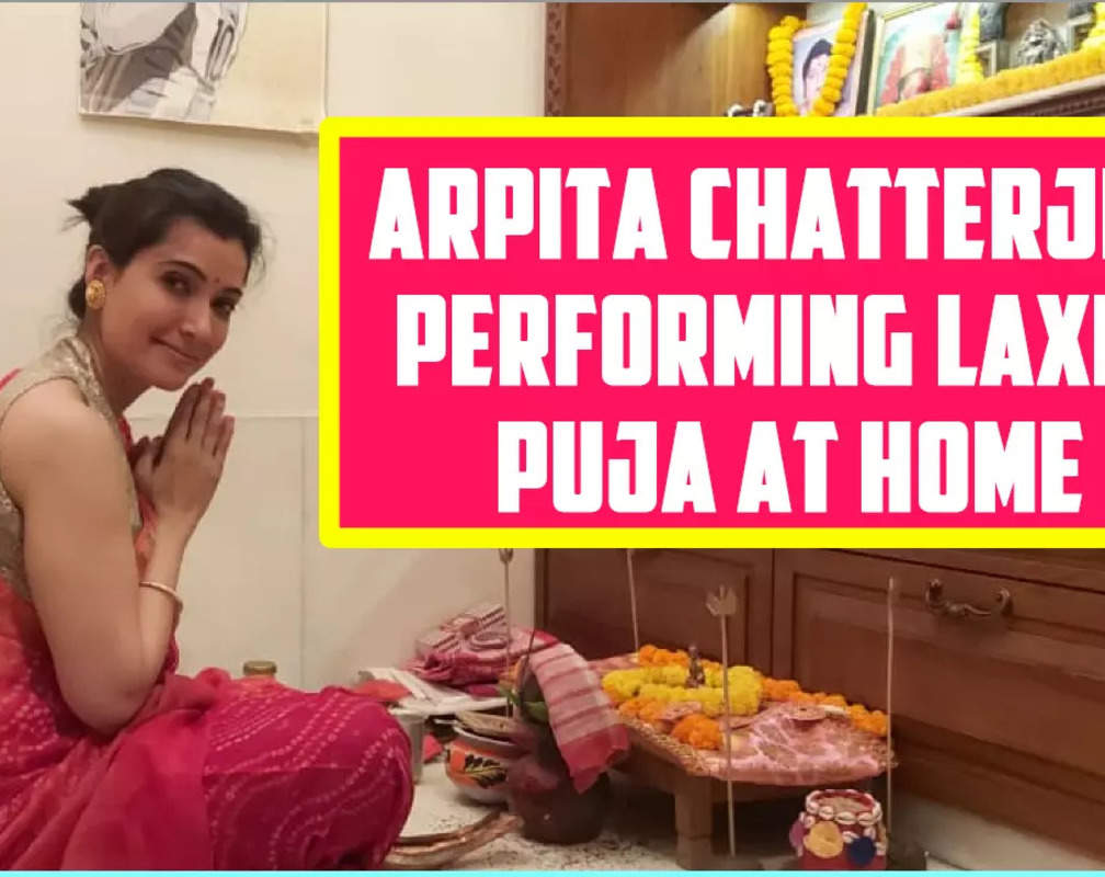 
Arpita Chatterjee performing Laxmi Puja at home

