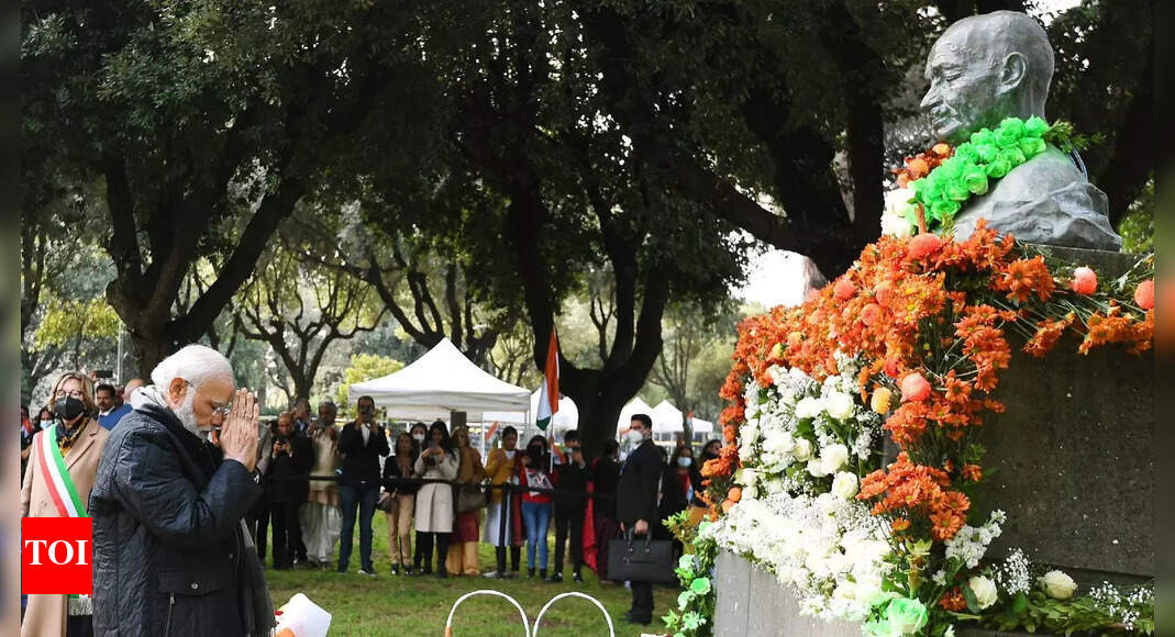 PM Modi pays floral tribute to Mahatma Gandhi at Piazza Gandhi in Rome ...