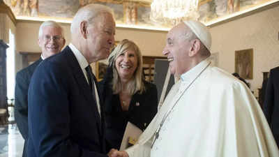 Joe Biden and pope hold long meeting as abortion debate flares at home