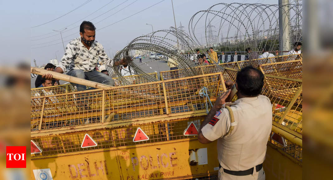 Delhi Police After 11 Months Delhi Border Barricades Start Coming   Photo 