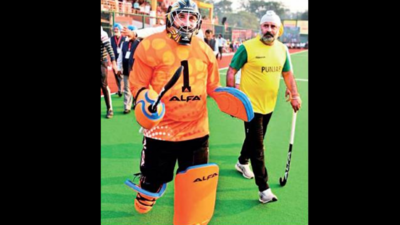 Punjab CM Charanjit Singh Channi dons goalie’s gear, defends hits from his sports minister