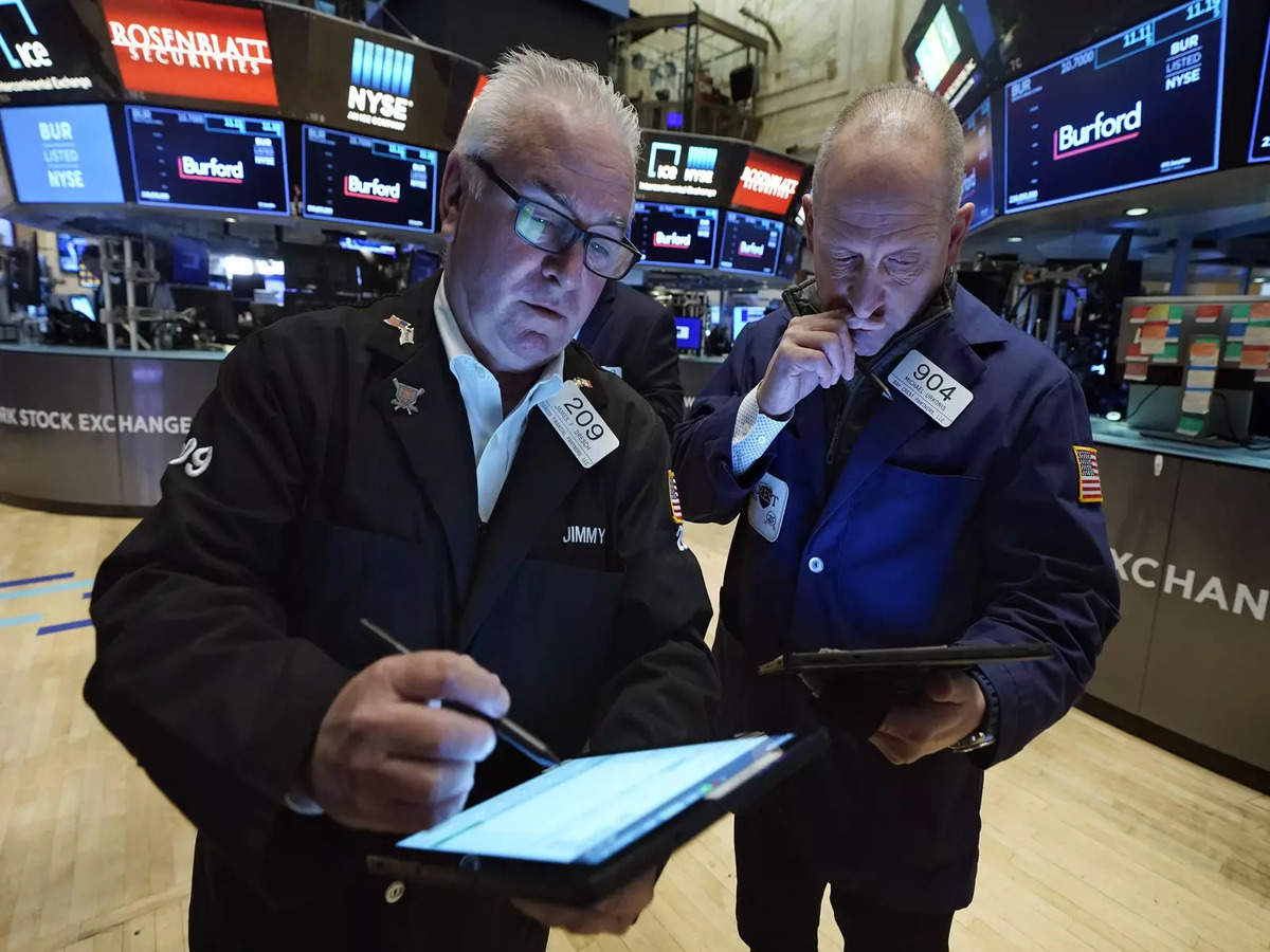 Fed Us Stocks End At Records After Fed Tapering Decision Times Of India