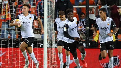 Valencia strike twice in added time to grab 3-3 draw with Atletico