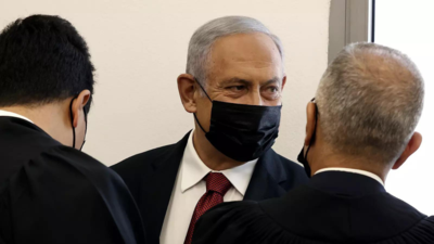 Netanyahu appears in court as ex-aide prepares to take stand