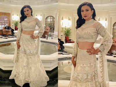 A graceful combination of subtlety and contemporary design, this heavily  embellished white lehenga featuring intricately designed floral ... |  Instagram