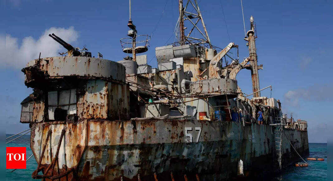 China coast guard blocks Philippine boats in disputed sea