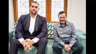 Impressed with AAP's work in Delhi, says WWE star Great Khali while meeting CM Arvind Kejriwal