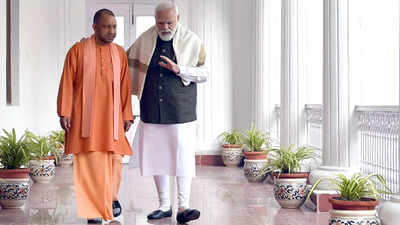 Yogi Adityanath shares picture with PM Modi, assures 'committed to