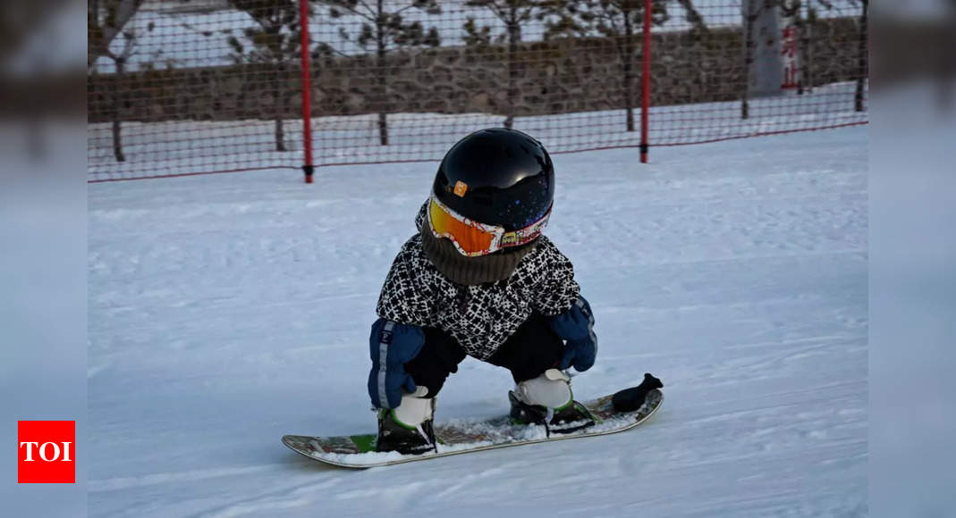snowboarding-baby-steals-hearts-and-headlines-in-china-times-of-india