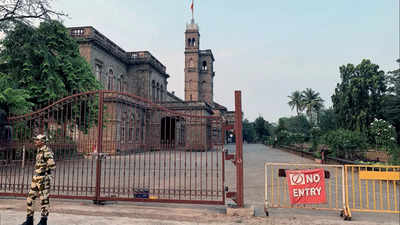 Gates blocking Savitribai Phule Pune University main building draw opposition