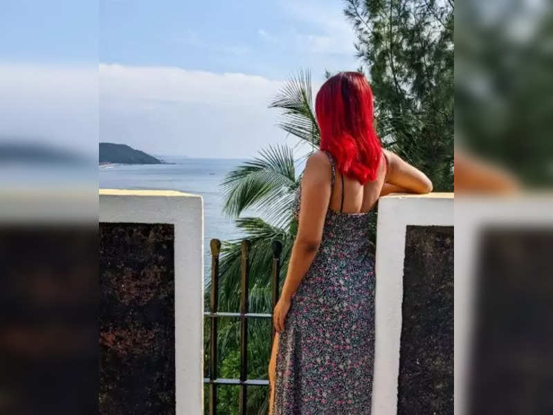 Red alert! Can you guess this stunning beauty from the hair colour?