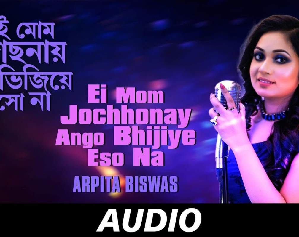 
Check Out New Bengali Song Music Audio - 'Ei Mom Jochhonay Ango Bhijiye' Sung By Arpita Biswas
