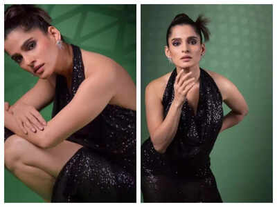 Priya Bapat looks ravishing in this black thigh-high slit gown with