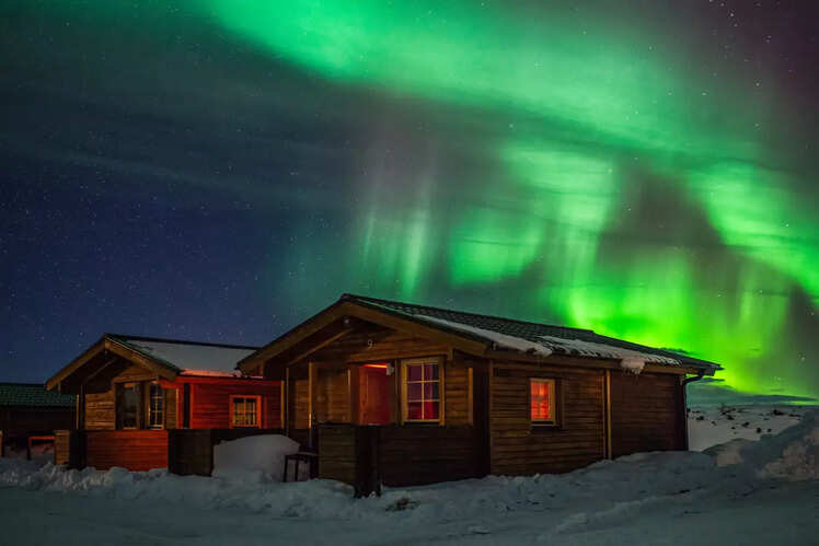Watch Northern Lights from a cabin