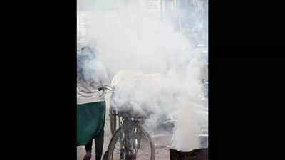 Smoke emanates from a roadside stall