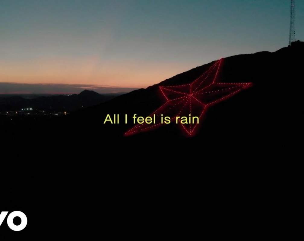 
Check Out Latest English Official Lyrical Video Song - 'All I Feel Is Rain' Sung By Khalid
