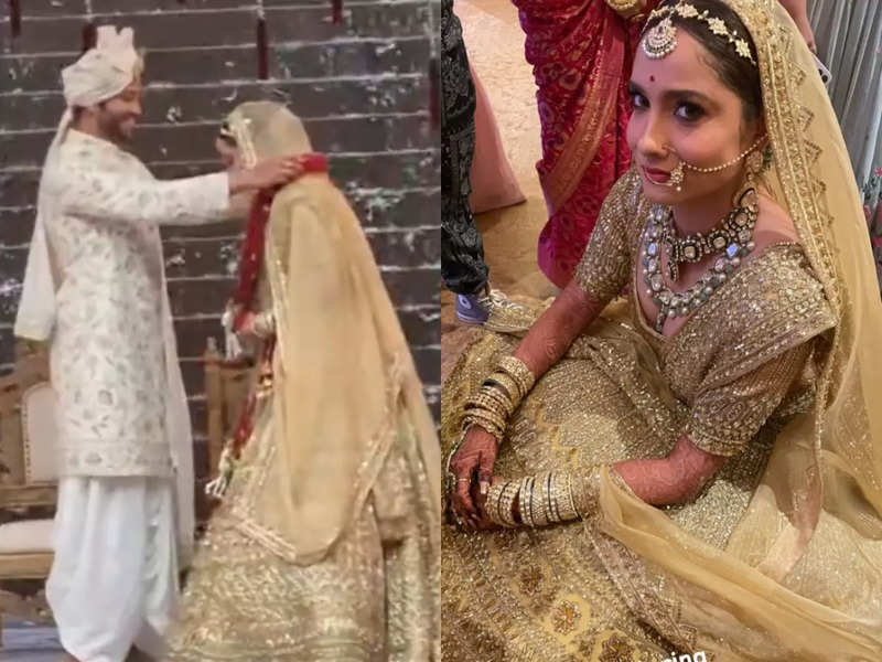 Ankita Lokhande glows in golden lehenga at her wedding with Vicky Jain; hugs him emotionally at the mandap - Times of India