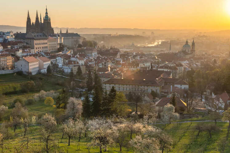 Watch the sun rise over Prague