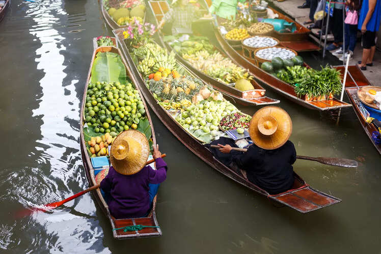 Go paddling about in Bangkok's floating market