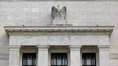 Fed sees three rate hikes in 2022 as inflation battle begins