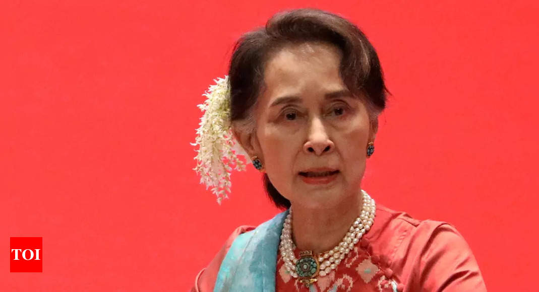 Myanmar’s ousted leader Suu Kyi appears in prison uniform in court – Times of India