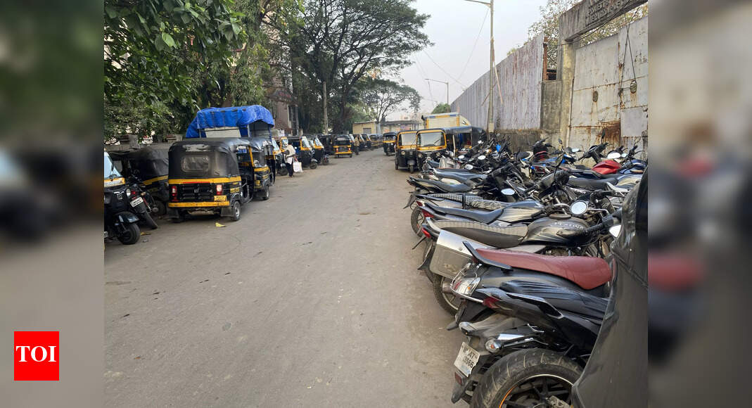 choking road by parking Times of India