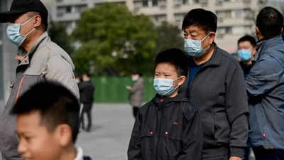 China expands lockdowns as Covid cases climb