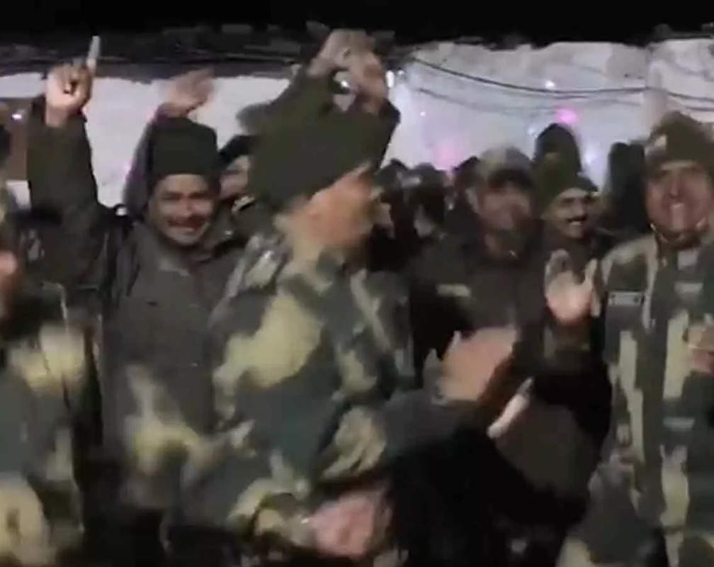 
BSF jawans celebrate on the eve of New Year 2022 in Jammu and Kashmir's Poonch
