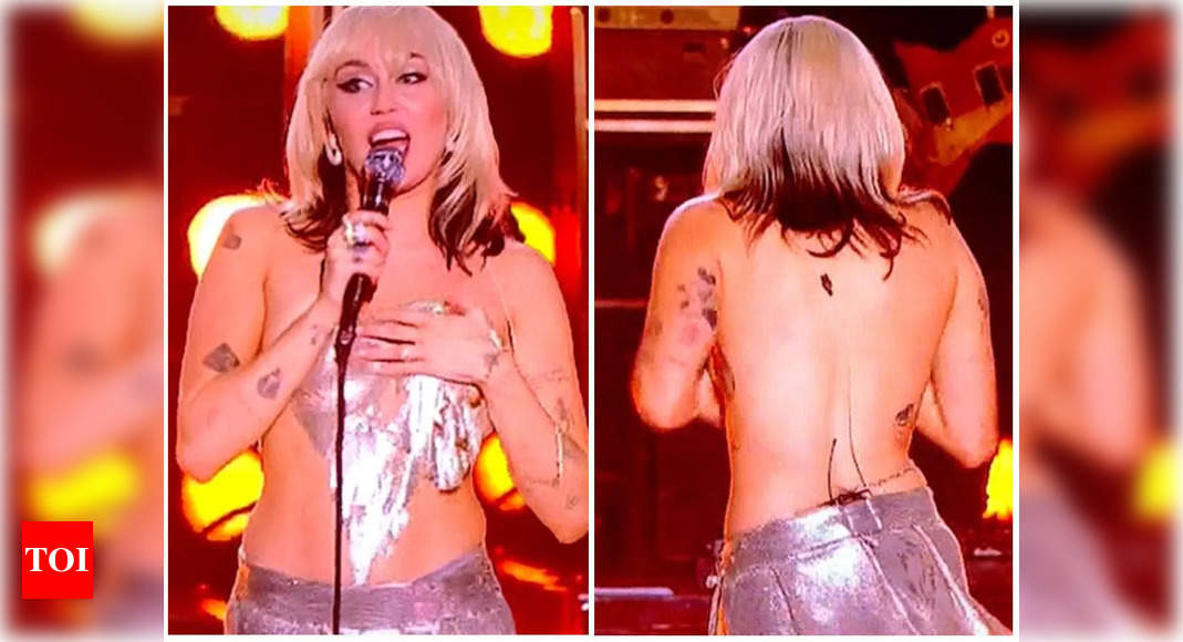 Watch: Miley’s top falls off during live show