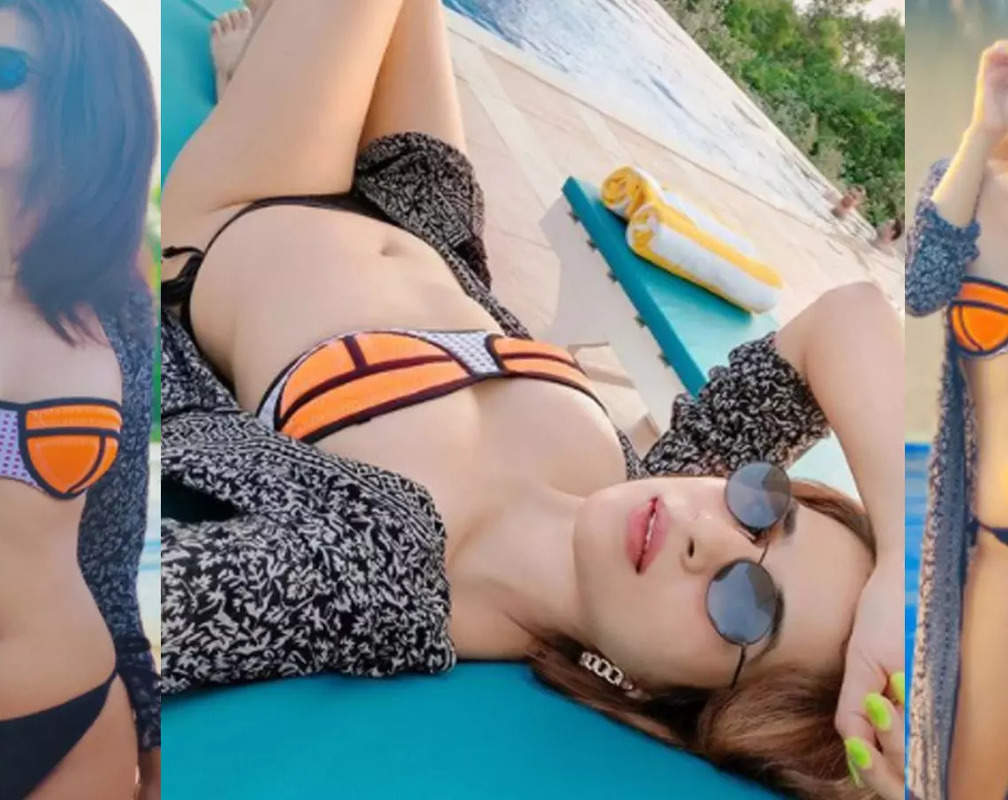 
Shraddha Das raises the temperature on internet by dropping her poolside bikini-clad pictures from Goa
