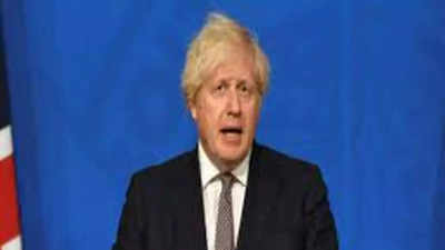 Amid Omicron surge, UK PM Johnson resists another lockdown