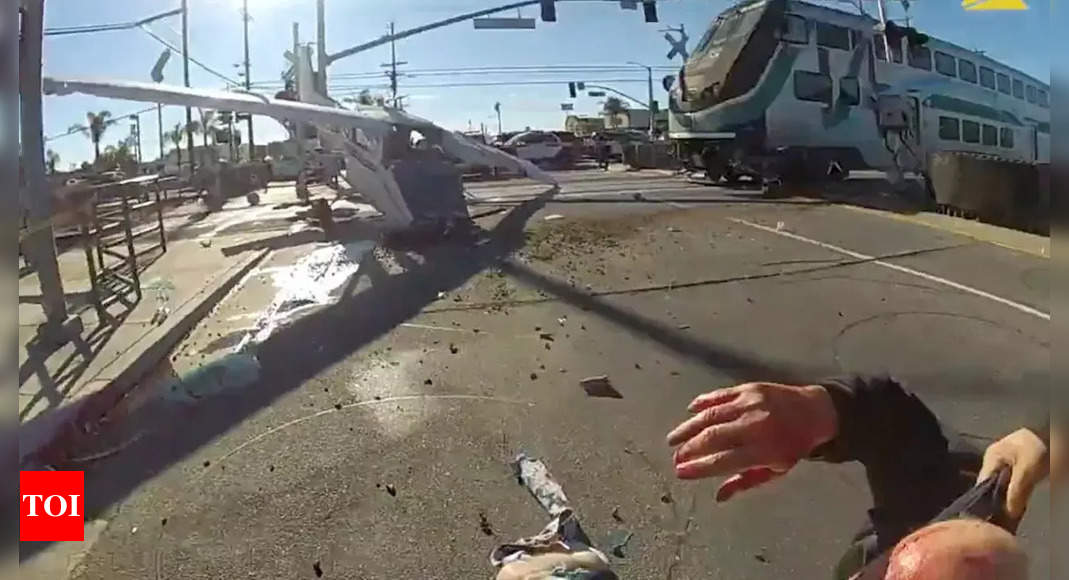 Pilot rescued from wreckage in LA moments before train hits