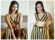 
Pics: Amala Paul takes the internet by storm in a yellow striped sleeveless outfit
