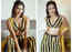 Pics: Amala Paul takes the internet by storm in a yellow striped sleeveless outfit
