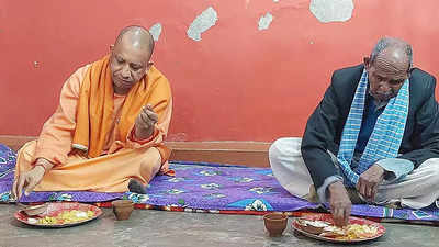UP CM Yogi Adityanath eats at dalit household, targets Samajwadi Party