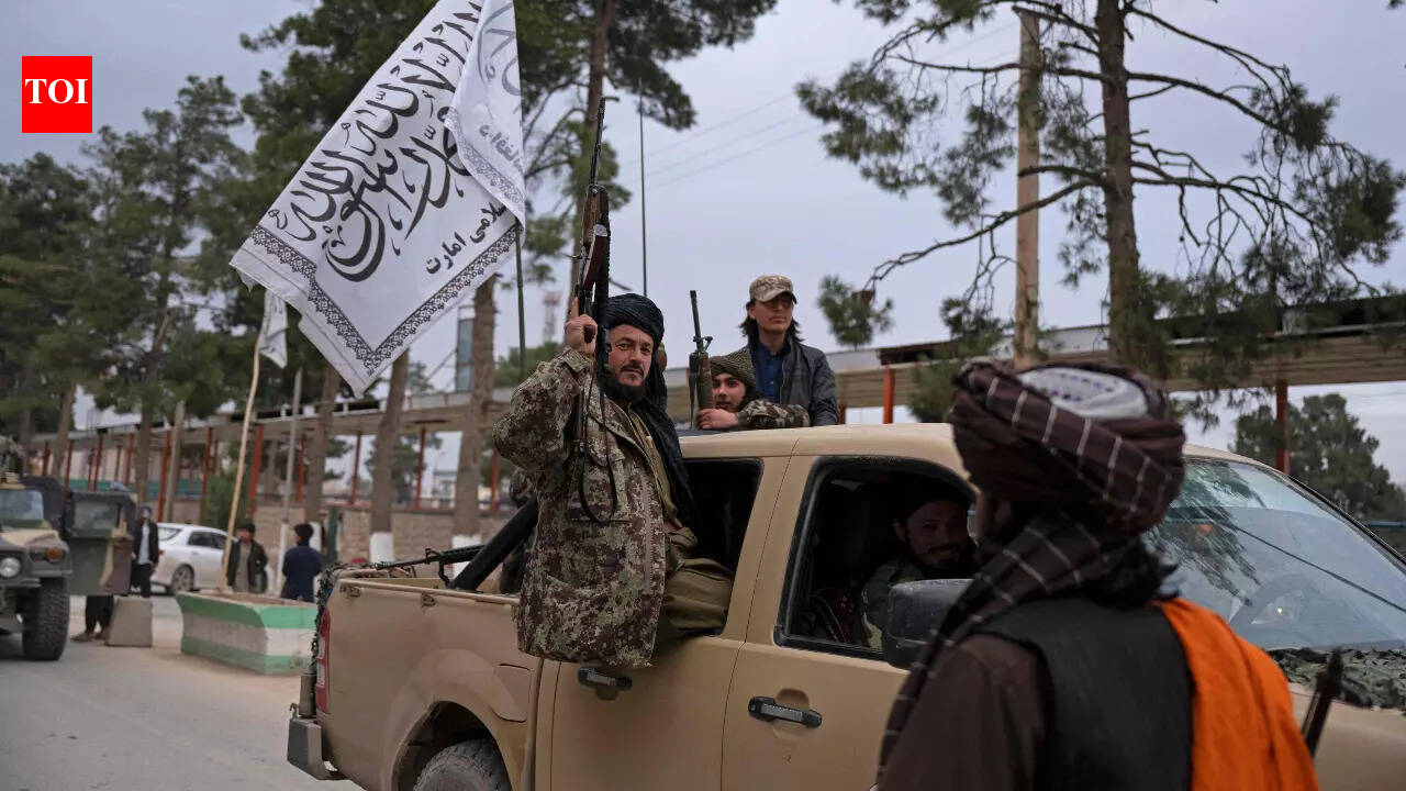 Taliban stage show of strength with parade after protests - The Times ...