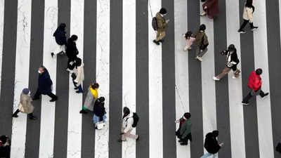 Japan ready to expand Covid restrictions as infections surge