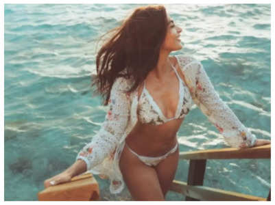 Pooja shares pic in bikini from beach vacay