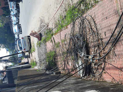 CABLES OBSTRUCT FOOT PATH