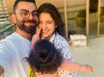 Fans go aww after pictures of Anushka Sharma with little Vamika cheering for Virat Kohli during a match go viral