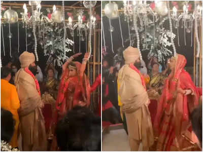 Mouni Roy and Suraj Nambiar exchange wedding wows as per Bengali traditions - view pic