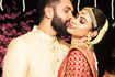 Mouni Roy and Suraj Nambiar seal it with a kiss in these latest beautiful pictures from their Bengali wedding