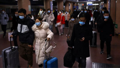 Chinese travel for Lunar New Year despite plea to stay put amid virus outbreaks
